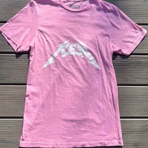 Barbie The Movie; Pink Short Sleeve Tee; White “Ken” Graphic in Metallica Font